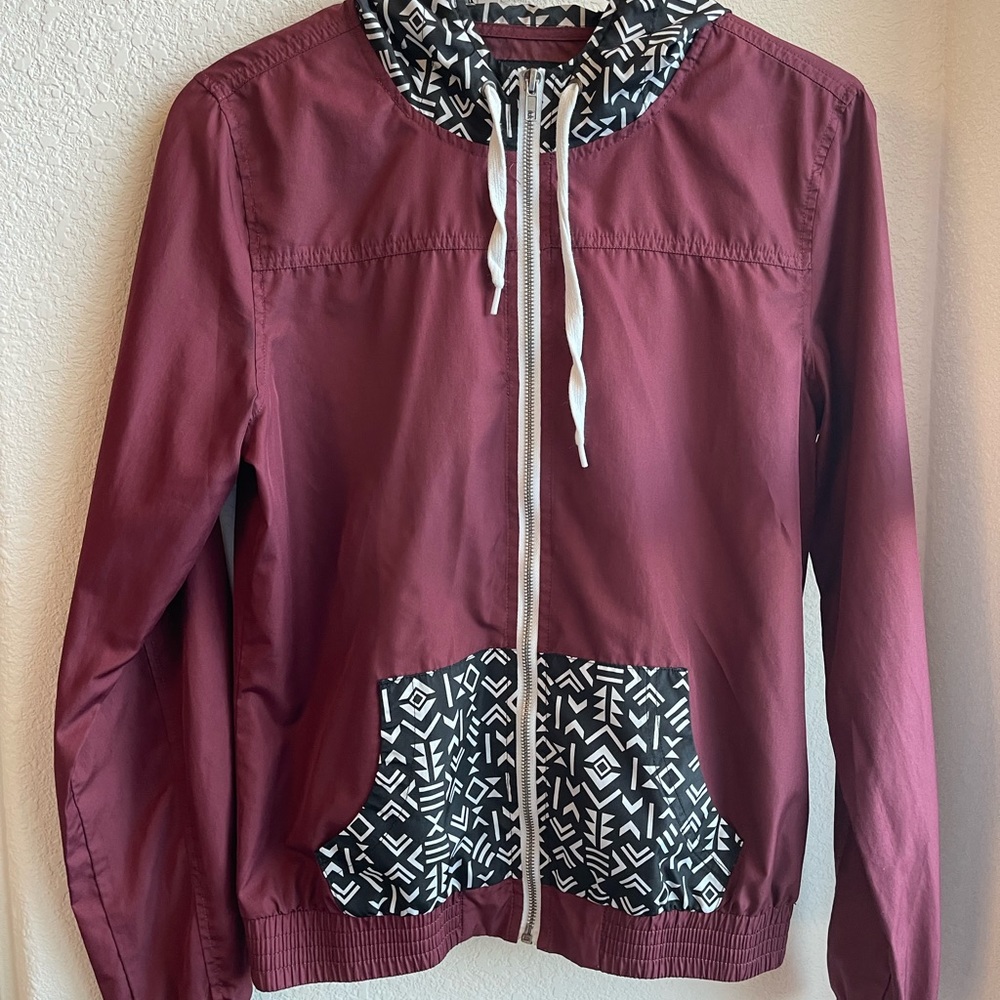 Burgundy windbreaker jacket